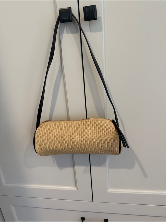 Moda Luxe Handbags - Moda Luxe Beige Straw Cylinder bag with Black Strap